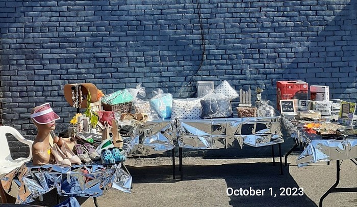 Our Pop Up Sidewalk Sale! We love being in the community 🧡
